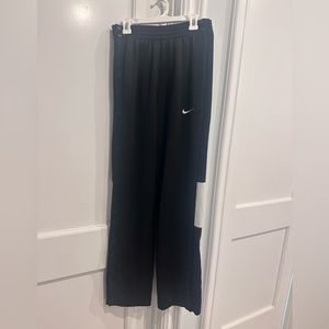 Black rip away Nike pants